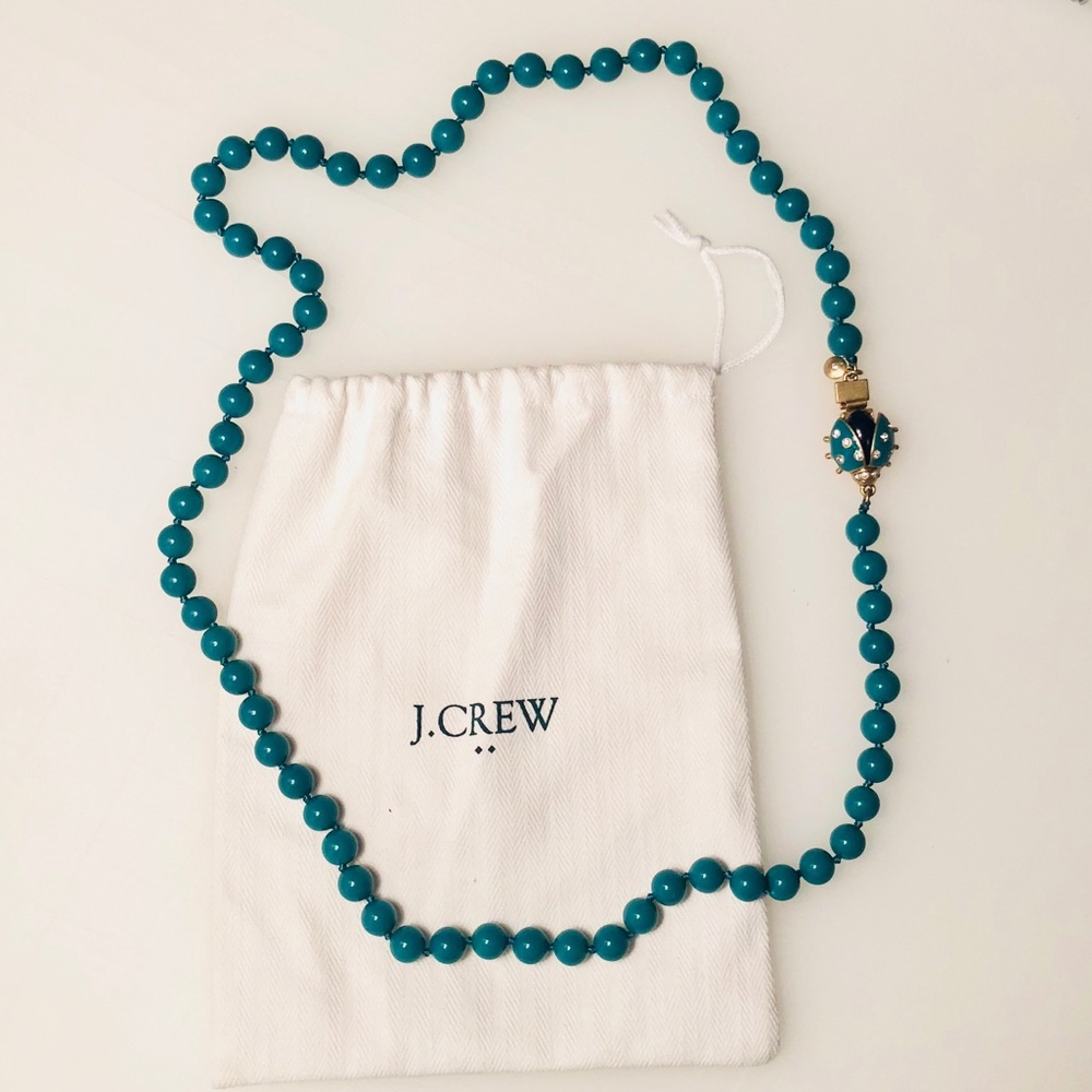 J. Crew bead necklace with ladybug clasp